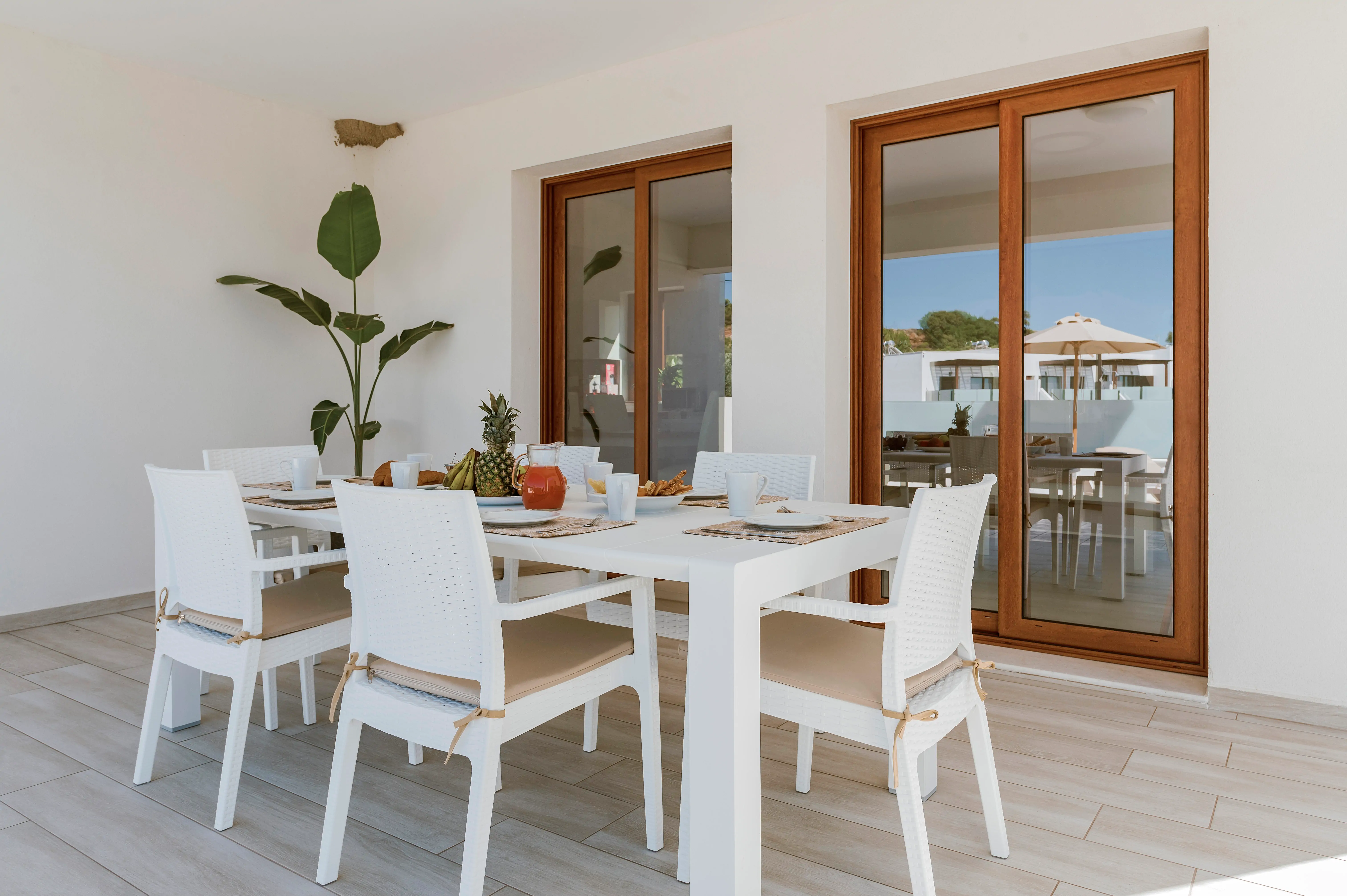 Outdoor dining table by the pool